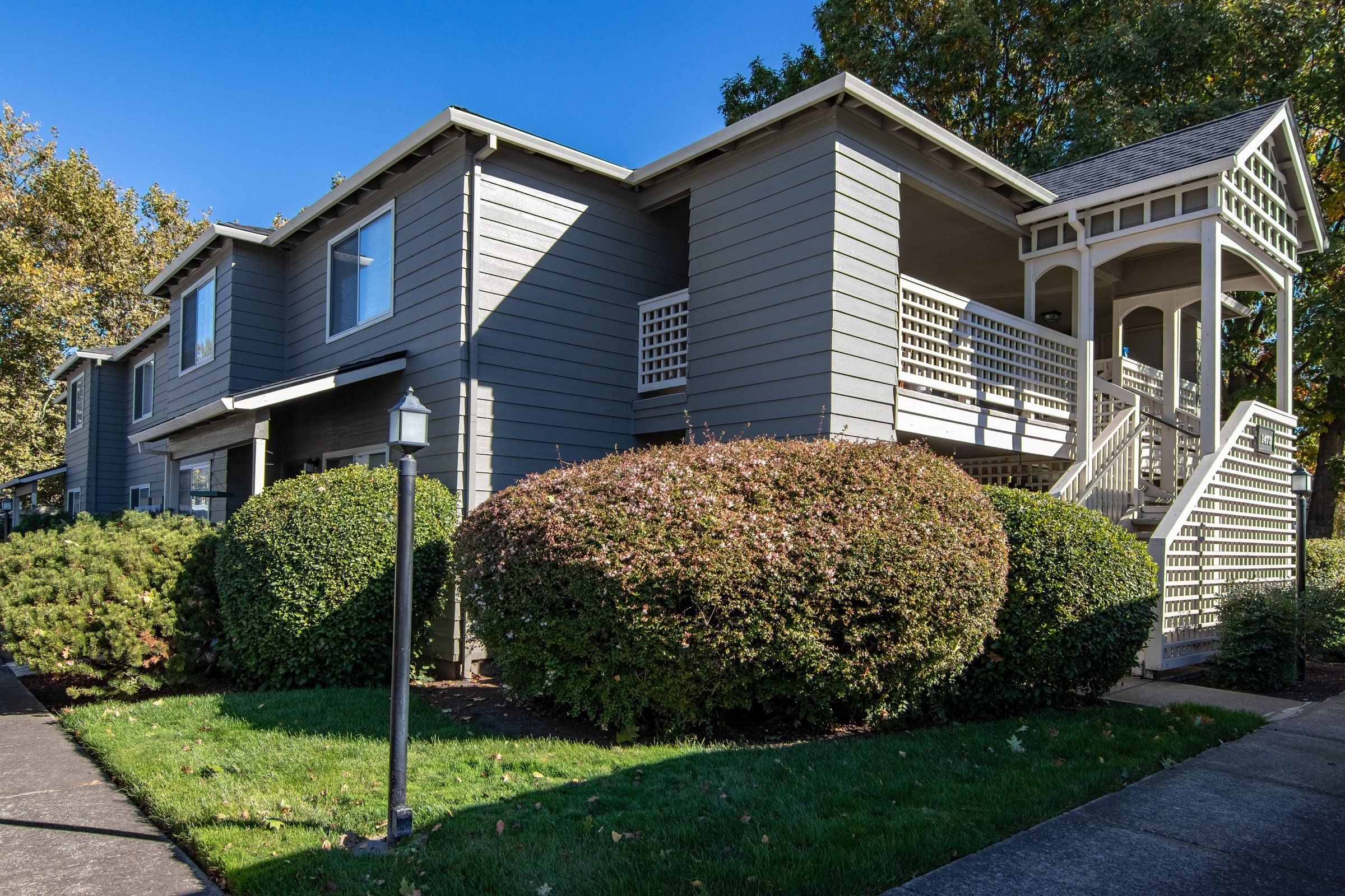 Garden-style multifamily apartment community with mature landscaping
